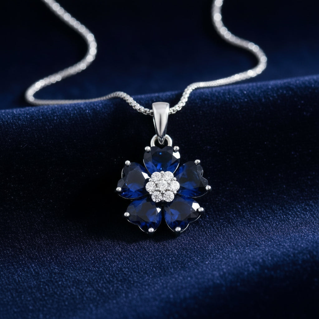 Floral pendant with blue gemstones