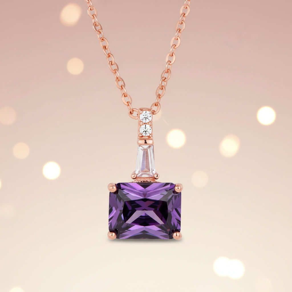 Purple gemstone pendant on a rose gold chain 