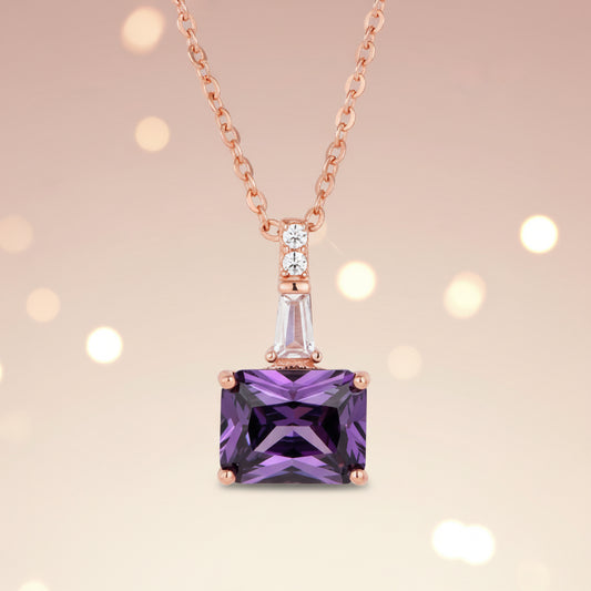 Purple gemstone pendant on a rose gold chain 