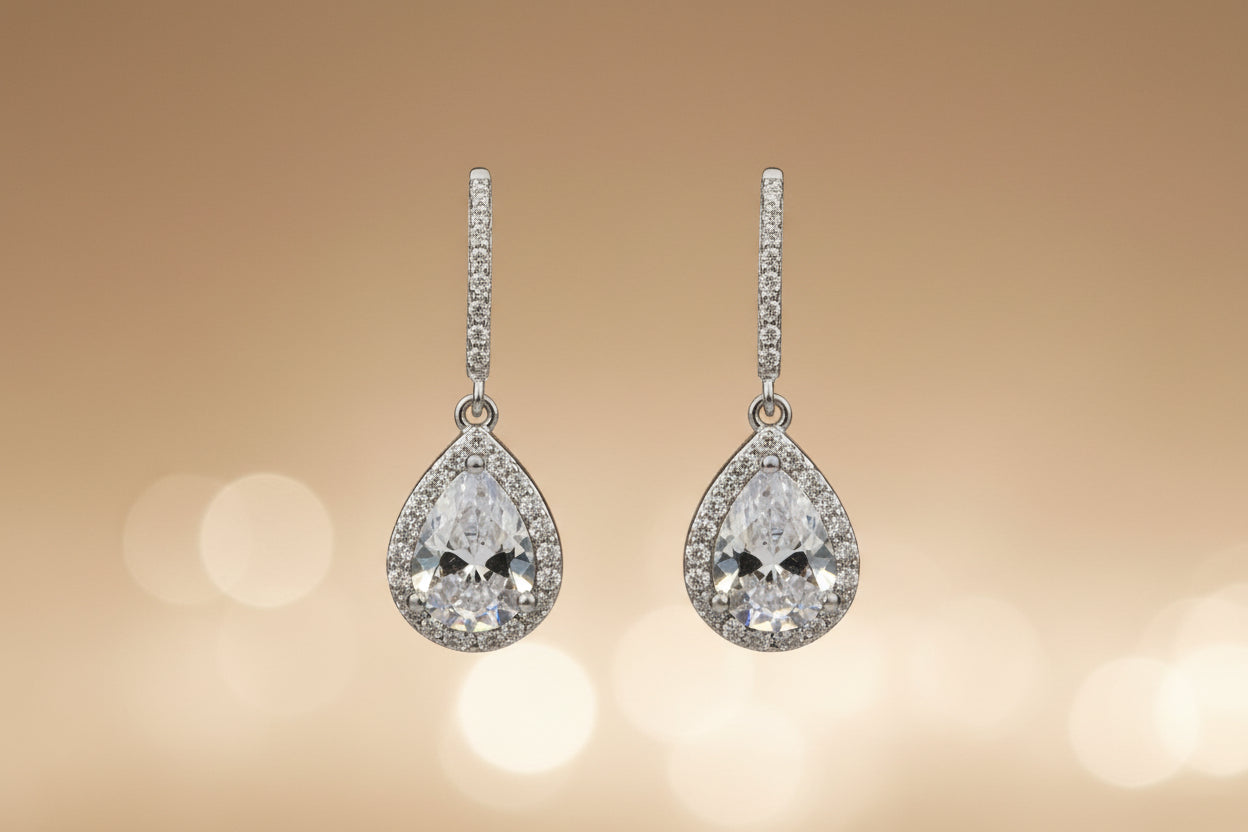 Teardrop-shaped earrings with clear gemstones